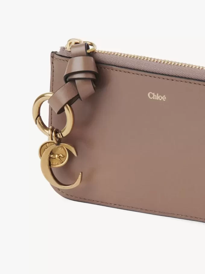 Alphabet purse in shiny leather Alphabet purse in shiny leather