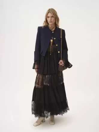 Boxy collarless jacket in wool check