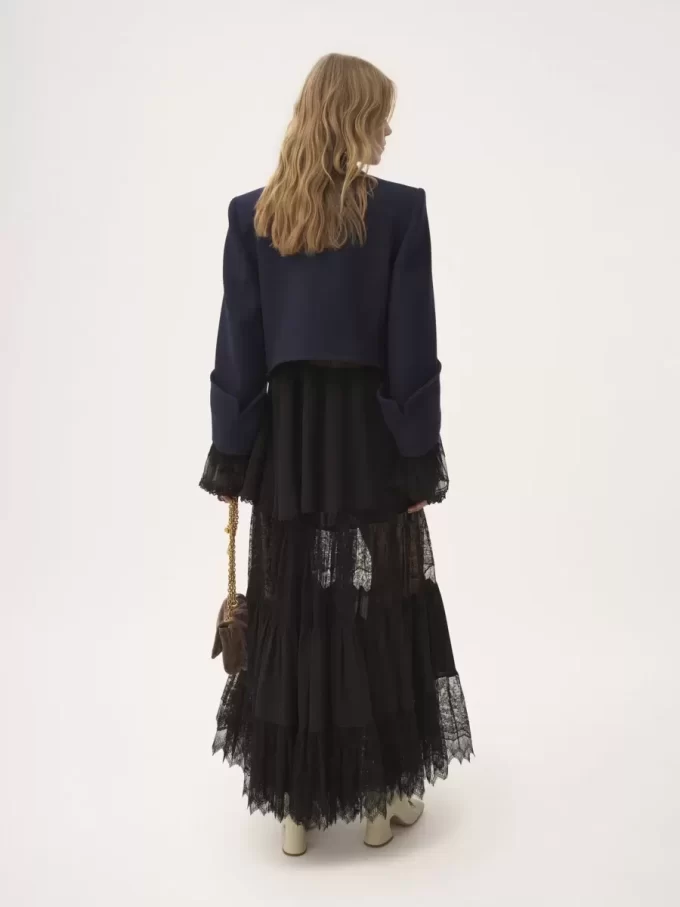 Boxy collarless jacket in wool check