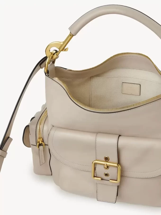 Camera bag in shiny leather