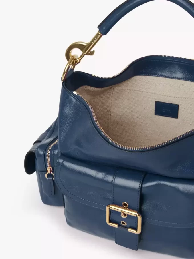 Camera bag in shiny leather