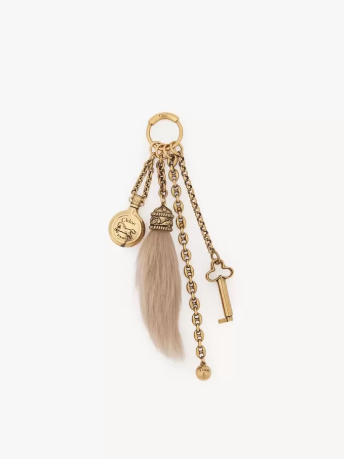Chloé Symbols bag charm in brass & shearling