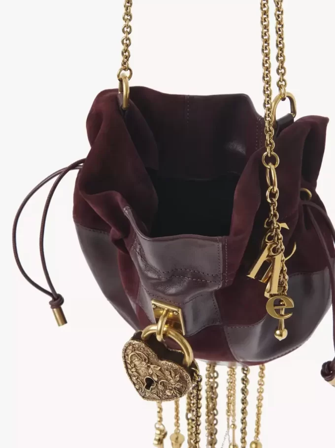 Château Treasures crossbody bag in grained & suede leather