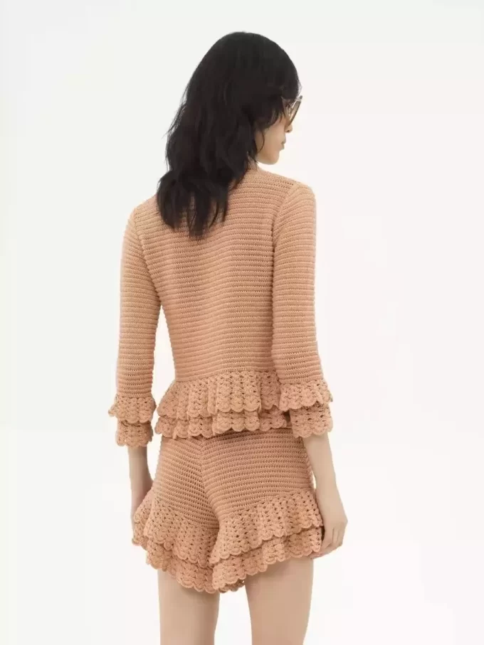 Fitted ruffled cardigan in crochet knit
