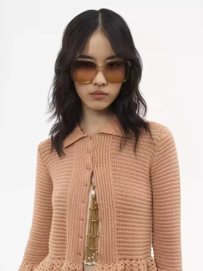 Fitted ruffled cardigan in crochet knit