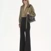 Flared tailored pants in wool grain de poudre