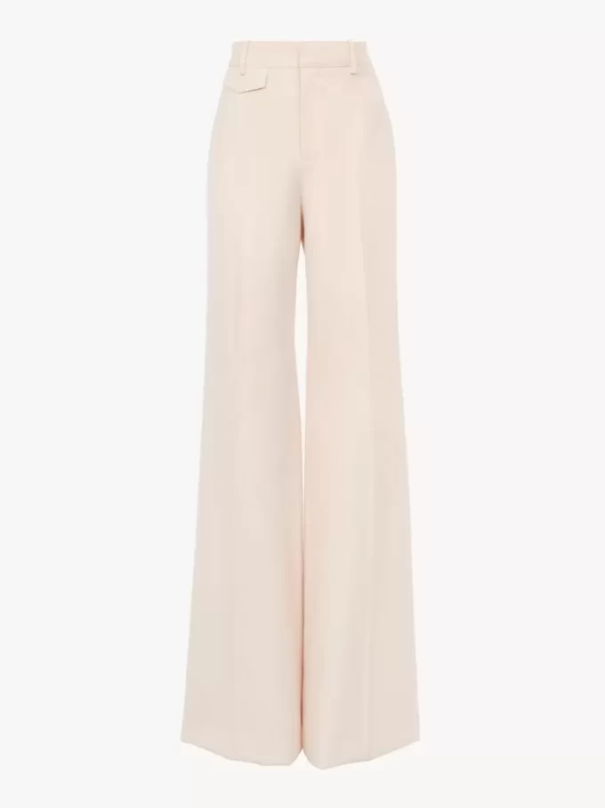 High-rise flared pants in wool gabardine