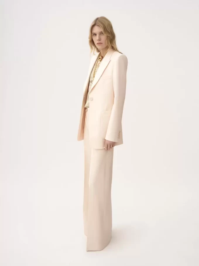 High-rise flared pants in wool gabardine