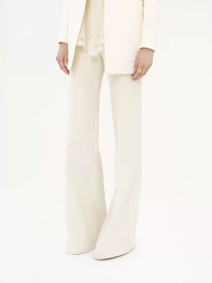 High-rise flared pants in wool grain de poudre