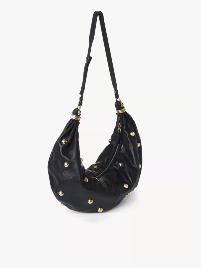 Large Bracelet hobo bag in grained leather with studs