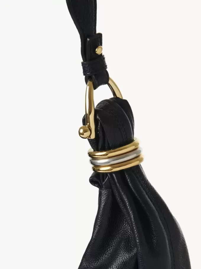 Large Bracelet hobo bag in grained leather with studs