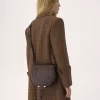 Marcie saddle bag in shiny leather