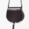 Marcie saddle bag in shiny leather