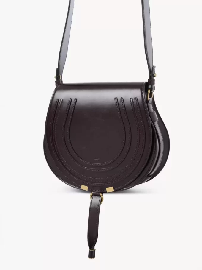 Marcie saddle bag in shiny leather