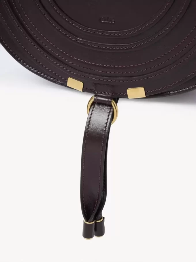 Marcie saddle bag in shiny leather