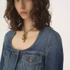 Peplum riding jacket in denim