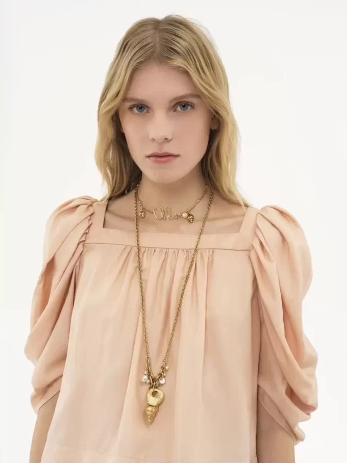 Puff-sleeve pleated top in silk poplin