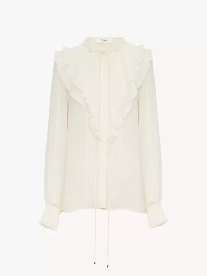 Ruffled blouse in silk georgette