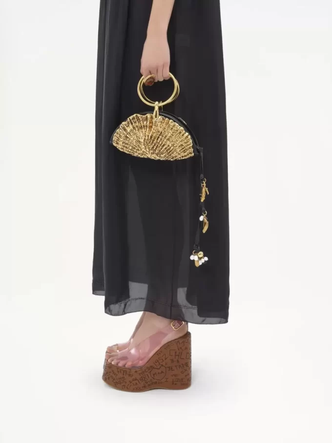 Sea Treasures Shell zipped clutch in soft leather & metal