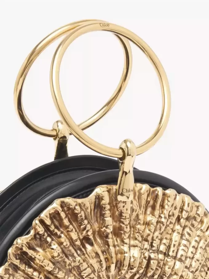 Sea Treasures Shell zipped clutch in soft leather & metal