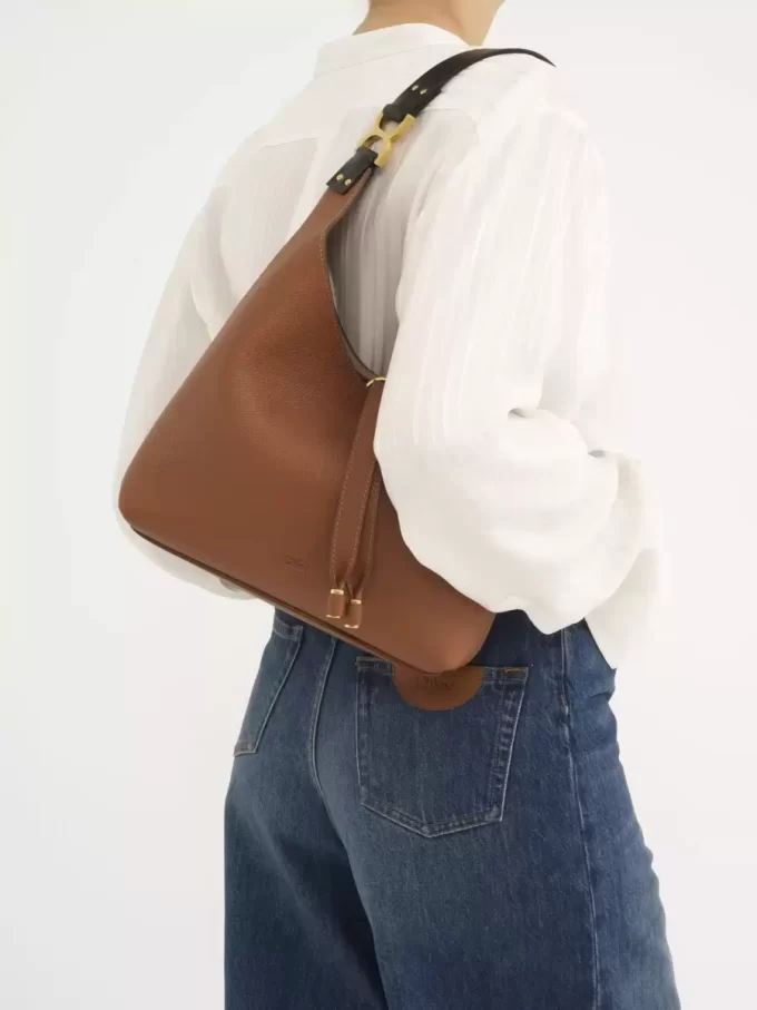 Small Marcie hobo bag in grained leather