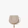 Small Marcie saddle bag in grained leather