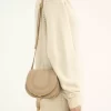 Small Marcie saddle bag in grained leather