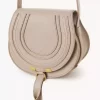 Small Marcie saddle bag in grained leather