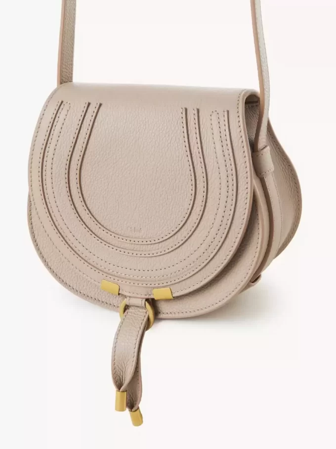 Small Marcie saddle bag in grained leather