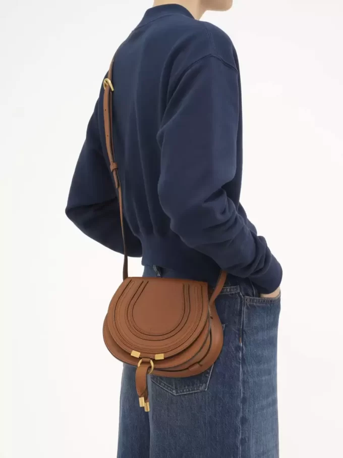 Small Marcie saddle bag in grained leather
