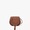 Small Marcie saddle bag in grained leather