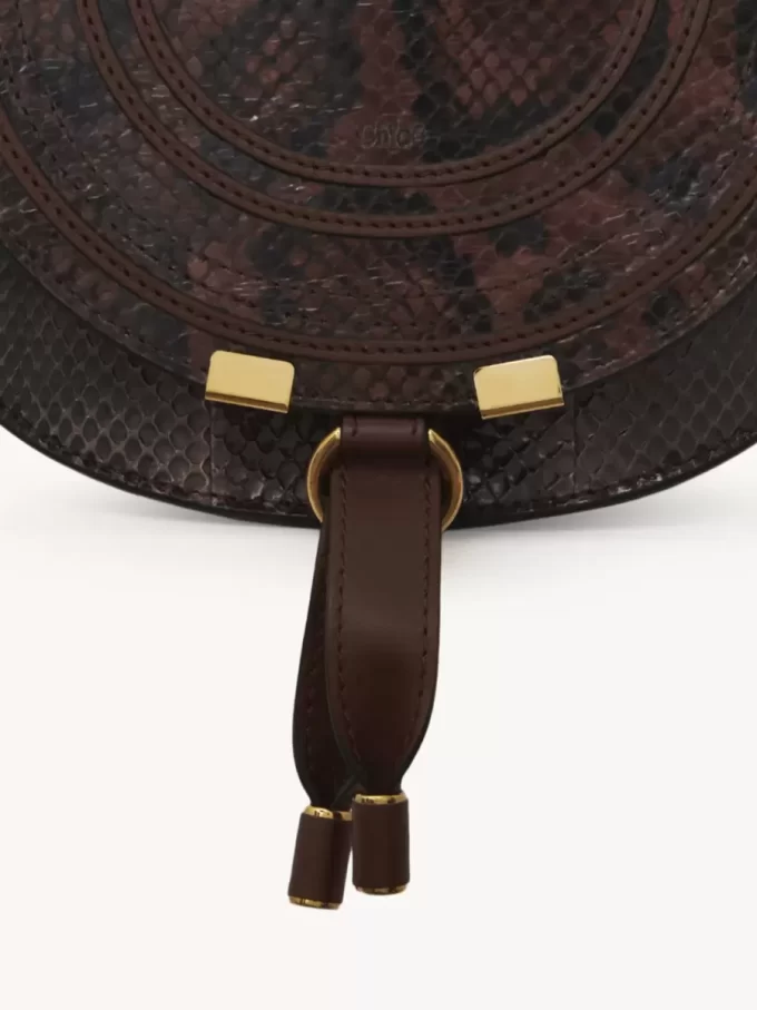 Small Marcie saddle bag in python-effect leather