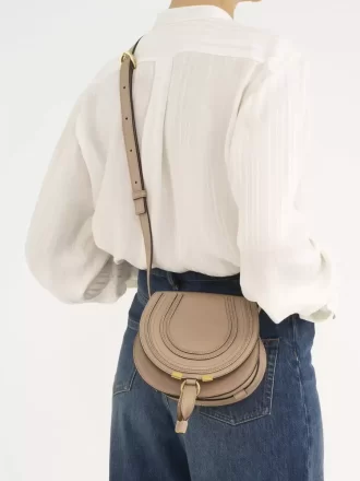 Small Marcie saddle bag in shiny leather