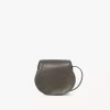 Small Marcie saddle bag in shiny leather
