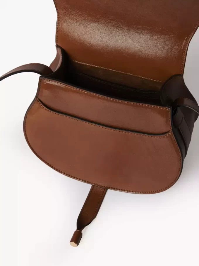 Small Marcie saddle bag in shiny leather
