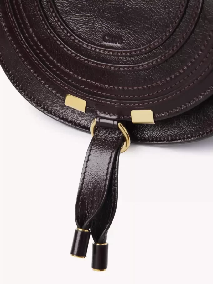 Small Marcie saddle bag in shiny leather