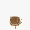 Small Marcie saddle bag in suede leather & shearling