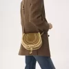 Small Marcie saddle bag in suede leather & shearling