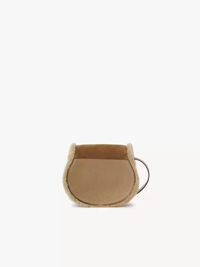 Small Marcie saddle bag in suede leather & shearling