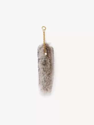 The Treasure Tails charm in shearling