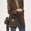 The Treasure Tails charm in shearling