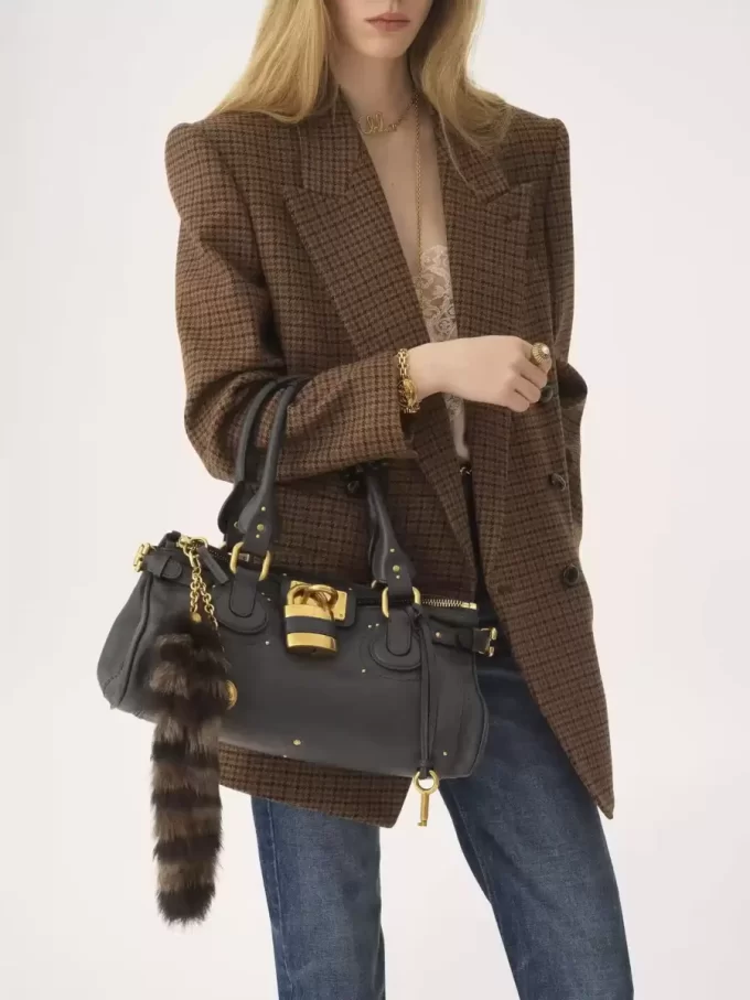 The Treasure Tails charm in shearling