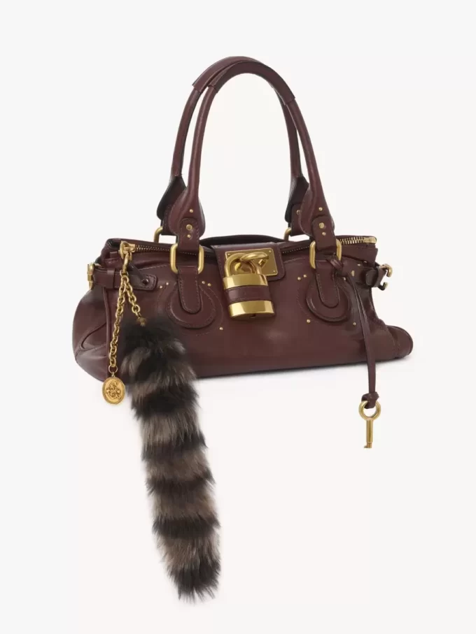 The Treasure Tails charm in shearling