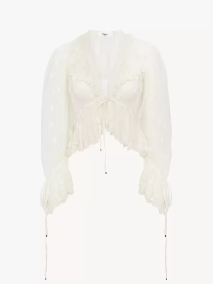 V-neck ruffle top in embroidered lace