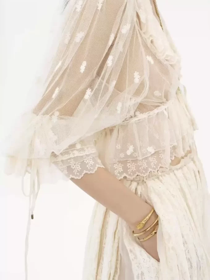 V-neck ruffle top in embroidered lace